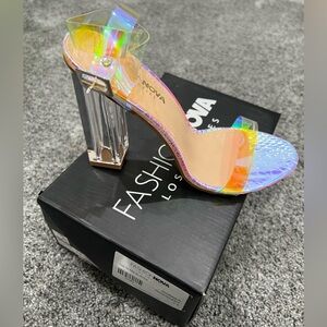 Iridescent “glass slipper” ice heels